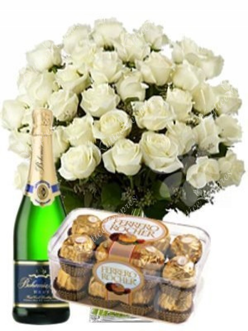 Set of white roses, sparkling wine and Ferrero Rocher