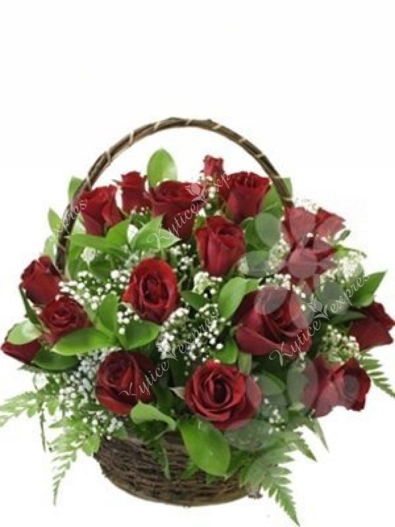 Flower basket of roses with gypsophila